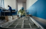 Technicians install beds and other equipment inside the isolation area for suspected cases at CBCA Virunga Hospital during rehabilitation work aimed at preparing the facility to receive potential Ebola cases, on May 22, 2026. (Photo by Jospin Mwisha / AFP)
