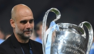 (Files) Manchester City's Spanish manager Pep Guardiola celebrates with the European Cup trophy on June 10, 2023. (Photo by Franck Fife / AFP)
 