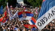 People march during an anti-government protest decrying corruption and calling for early elections following the collapse of a railway station canopy in Novi Sad that killed 16 in November 2024, in central Belgrade on May 23, 2026. (Photo by Andrej Isakovic / AFP)
 