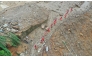 An aerial drone photo taken on May 24, 2026 shows rescuers working on site after a heavy rainstorm hit Yongchuan District in southwest China's Chongqing Municipality. (Xinhua/Wang Quanchao)