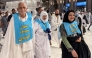 Iranian pilgrims (front) pose for a photograph after performing the Umrah minor pilgrimage at the Grand Mosque complex in the holy city of Mecca on May 23, 2026, ahead of the annual Hajj pilgrimage. (Photo by AFP)