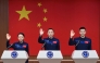Astronauts for China's Shenzhou-23 space mission Lai Ka-ying (L), Zhu Yangzhu (C) and Zhang Zhiyuan (R) wave during a press conference before the launch of the mission at the Jiuquan Satellite Launch Center in the Gobi desert in Jiuquan, in northwestern China's Gansu province on May 23, 2026. (Photo by CNS / AFP)