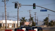 Orange County sheriff deputies block Western Avenue at Katella Avenue as roads remain closed after a chemical leak in Garden Grove, California, on May 24, 2026. (Photo by Blake Fagan / AFP)