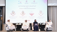 Panelists exchanging ideas during the seminar on the debt instruments market in Qatar. 