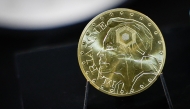 This photograph shows a Marianne-Or gold coin bullion displayed at La Monnaie de Paris in Paris on May 21, 2026. (Photo by Simon Wohlfahrt / AFP)