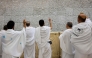 Muslim pilgrims perform the symbolic 'stoning of the devil' ritual as part of the Hajj pilgrimage in Mina on May 27, 2026. (Photo by Zain Jaafar / AFP)
