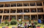 Relatives gather and wait for news of their loved ones at the Utumishi Girls Academy following the deadly fire in Gilgil, north of the capital Nairobi on May 28, 2026. (Photo by Simon Maina / AFP)