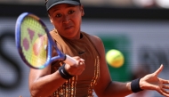 Japan's Naomi Osaka plays a forehand return to US Iva Jovic in Paris on May 30, 2026. (Photo by Anne-Christine Poujoulat / AFP)