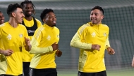 Al Gharafa players attend a training session in this file photo.
