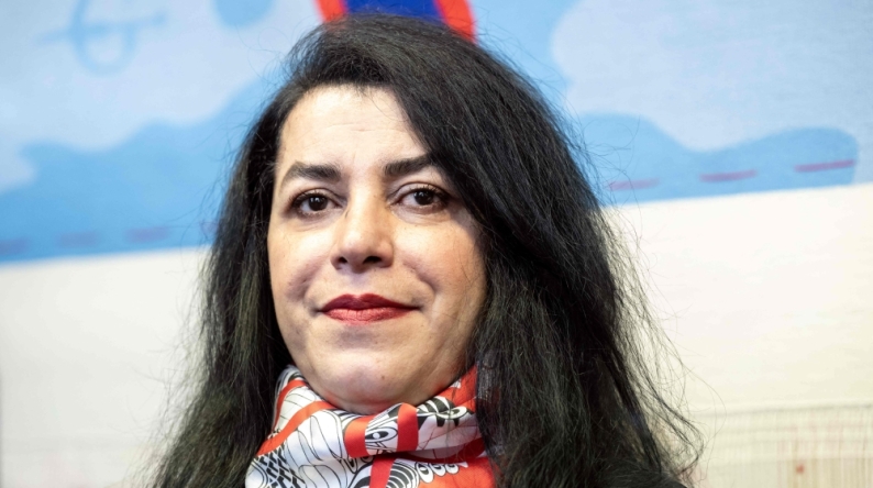 (Files) French-Iranian graphic novelist and illustrator Marjane Satrapi during the unveiling of an Olympic triptych tapestry created for the Paris 2024 Olympic Games on March 12, 2024. (Photo by Bertrand Guay / AFP)
 