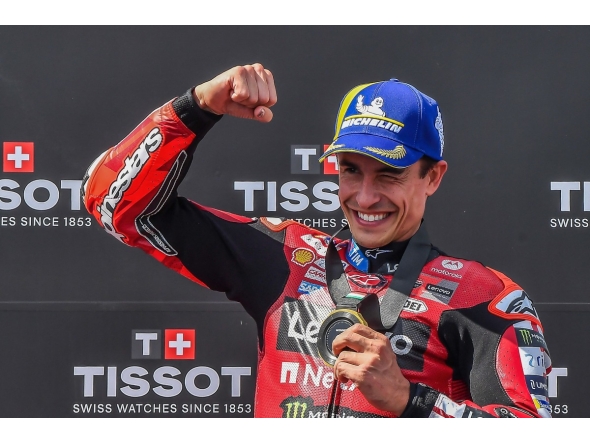 Team Ducati Lenovo Team's Marc Marquez celebrates winning the Sprint competition at the Balaton Park Circuit in Balatonfokajar, Hungary, on June 6, 2026, ahead of the Hungarian Motorcycle MotoGP Grand Prix. (Photo by FERENC ISZA / AFP)
