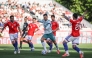 Portugal's Cristiano Ronaldo (centre) controls the ball.