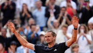 Germany's Alexander Zverev celebrates after winning the mens final singles match against Italy's Flavio Cobolli on day 15 of the French Open tennis tournament on Court Philippe-Chatrier at the Roland-Garros Complex in Paris on June 7, 2026. (Photo by Dimitar DILKOFF / AFP)