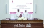 Director General of the Qatar Press Center Sadiq Mohammed Al Amari and Vice President for Academic Affairs at Qatar University Prof Ibrahim Mohammed Al Kaabi exchanging documents after signing the agreement.