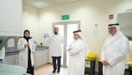 Minister of Environment and Climate Change H E Dr. Abdullah bin Abdulaziz bin Turki Al Subaie inspecting the Environmental Laboratory section during his visit.