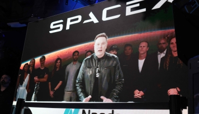 SpaceX founder and CEO Elon Musk speaks via video at the Nasdaq Marketsite in Times Square during the launch of the SpaceX initial public offering (IPO) on the Nasdaq on June 12, 2026, in New York City. Photo by SPENCER PLATT / GETTY IMAGES NORTH AMERICA / Getty Images via AFP