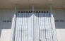 Tarps are hung on scaffolding outside The Kennedy Center on June 13, 2026 in Washington, DC. Friday late night workers removed the President Donald Trump's name from the Kennedy Center. (Photo by Tasos Katopodis/AFP)
