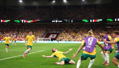 Connor Metcalfe #8 of Australia celebrates scoring his team's second goal during the FIFA World Cup 2026 Group D match between Australia and Türkiye at BC Place Vancouver on June 13, 2026 in Vancouver, British Columbia. (Photo by Dean Mouhtaropoulos /AFP)