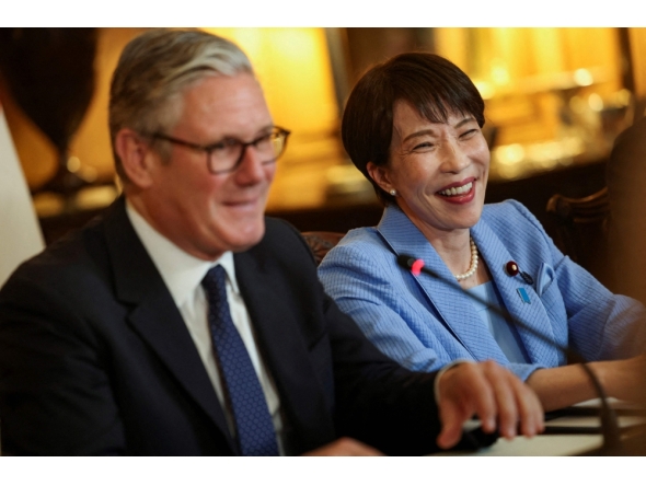 Britain's Prime Minister Keir Starmer (L) and Japan's Prime Minister Sanae Takaichi attend a business roundtable meeting at Downing Street in central London on June 14, 2026. (Photo by Toby Shepheard / POOL / AFP)