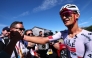 UAE Team Emirates XRG's Mexican rider Isaac Del Toro Romero celebrates winning the 8th and final stage of the Tour Auvergne-Rhone-Alpes cycling race, 120,1km between Beaufort and Plateau de Solaison, in the French Alps on June 14, 2026. (Photo by Anne-Christine POUJOULAT / AFP)