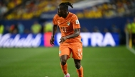 Ivory Coast's forward #11 Yan Diomande runs with the ball during the 2026 World Cup Group E football match on June 14, 2026. (Photo by Mauro Pimentel / AFP)