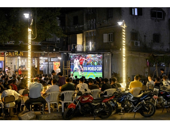 Egyptian football fans watch their national team's 2026 World Cup Group G football match against Belgium, at an outdoor cafe in the Sharabiya district of Cairo on June 15, 2026. (Photo by Khaled Desouki / various sources / AFP)