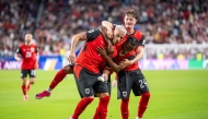 Austria's forward #07 Marko Arnautovic (L), celebrate with Austria's midfielder #17 Carney Chukwuemeka and Austria's midfielder #24 Paul Wanner after scoring a penalty shot during the 2026 World Cup Group J football. Photo by Georg Hochmuth / APA / AFP