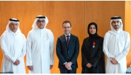 Minister of Communications and Information Technology, H E Mohammed bin Ali Al-Mannai (second left); Ambassador of the French Republic to Qatar, H E Arnaud Pescheux (centre); and Assistant Undersecretary for Digital Industry Affairs at MCIT, H E Reem Mohammed Al-Mansoori (second right), with other officials.