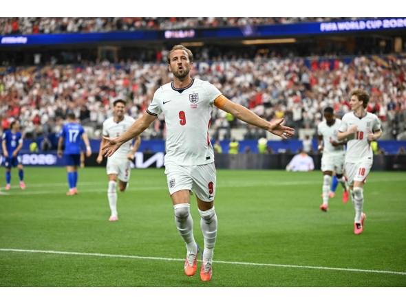 England's forward #09 Harry Kane celebrates after scoring his team's second goal during the 2026 World Cup Group L football match between England and Croatia at the Dallas Stadium in Arlington on June 17, 2026. (Photo by Paul ELLIS / AFP)