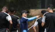 Qatar coach Julen Lopetegui with his players.