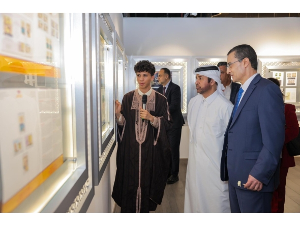 General Manager of Katara Cultural Village Foundation Professor Dr. Khalid bin Ibrahim Al-Sulaiti, Ambassador of the Republic of Tunisia to the State of Qatar H E Farhad Khalif and other officials view the gallery as artist Youssef Ftouhi explains his collection.