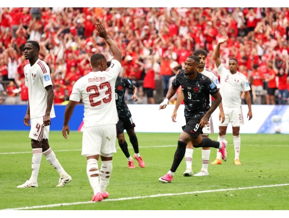 Cyle Larin #9 of Canada celebrates scoring his team's first goal during the FIFA World Cup 2026 Group B match between Canada and Qatar at BC Place Vancouver on June 18, 2026 in Vancouver, British Columbia. (Photo by Fran Santiago / GETTY IMAGES NORTH AMERICA / Getty Images via AFP)
