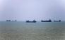 Vessels are seen anchored in Bandar Abbas along the Strait of Hormuz.  (Photo by AmirHossein Khorgooei/ ISNA / AFP) /