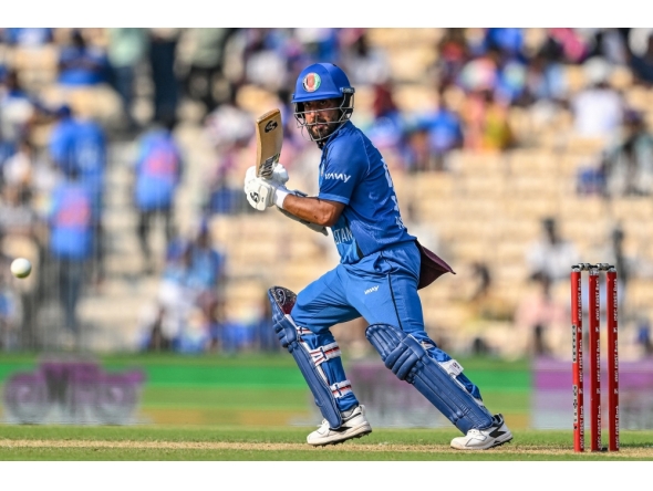 Afghanistan's captain Hashmatullah Shahidi plays a shot during the third one-day international (ODI) cricket match between India and Afghanistan on June 20, 2026. (Photo by R.Satish Babu / AFP)