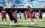 Qatar players participate in a training session.