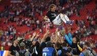 Croatia's midfielder #10 Luka Modric is lifted up by his teammates as they celebrate after winning the 2026 World Cup Group L football match between Panama and Croatia at the Toronto Stadium in Toronto on June 23, 2026. (Photo by Cole Burston / AFP)