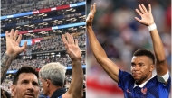  Lionel Messi (left) and Kylian Mbappe