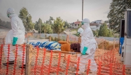 Healthcare workers carry on a stretcher a patient suffering from the Ebola virus disease from an ambulance at the Ebola Treatment Center (ETC) in Bunia, Ituri, in the east of the Democratic Republic of Congo on June 23, 2026. (Photo by Benediction MURHABAZI / AFP)