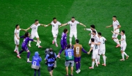 Mexico's players gather around goalkeeper #13 Guillermo Ochoa after winning the 2026 World Cup Group A football match between the Czech Republic and Mexico at the Mexico City Stadium in Mexico City on June 24, 2026. (Photo by Rodrigo Oropeza / AFP)