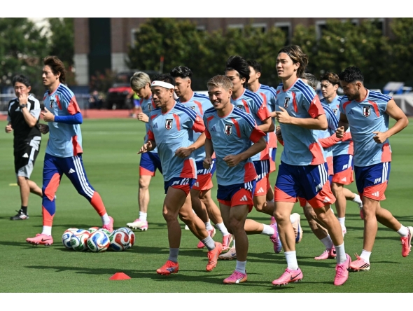 Japan players warm up during a training session. (AFP)