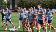 Japan players warm up during a training session. (AFP)