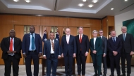 Vanuatu's Trade and Commerce Minister Samson Samsen, Foreign Minister Marc Ati, and Prime Minister Jotham Napat pose for a group photo after an agreement signing ceremony with Australian Prime Minister Anthony Albanese, Defence Minister Richard Marles, Foreign Minister Penny Wong, Minister for Defence Industry and Pacific Island Affairs Pat Conroy, Minister for Climate Change and Energy Chris Bowen, and Minister for Immigration and Citizenship Tony Burke at Parliament House in Canberra on June 29, 2026. (Photo by DAVID GRAY / AFP)