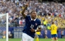Kylian Mbappe #10 of France celebrates scoring his team's third goal. Al Bello/Getty Images/AFP