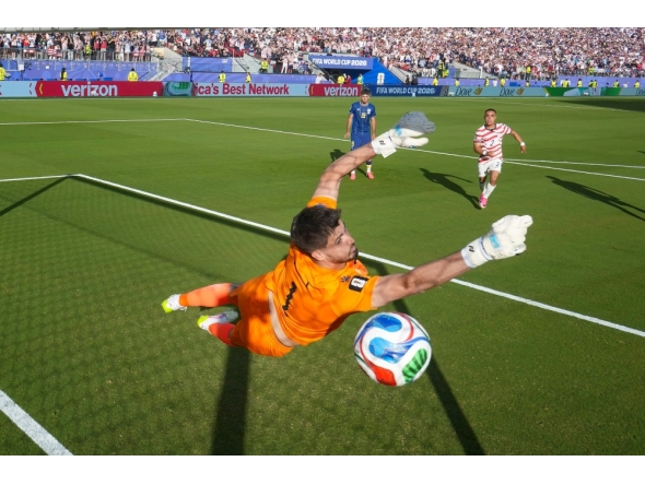 Nikola Vasilj #1 of Bosnia and Herzegovina fails to save a freekick from Malik Tillman #17 of the United States on July 01, 2026 in Santa Clara, California. Charlotte Wilson/Getty Images/AFP