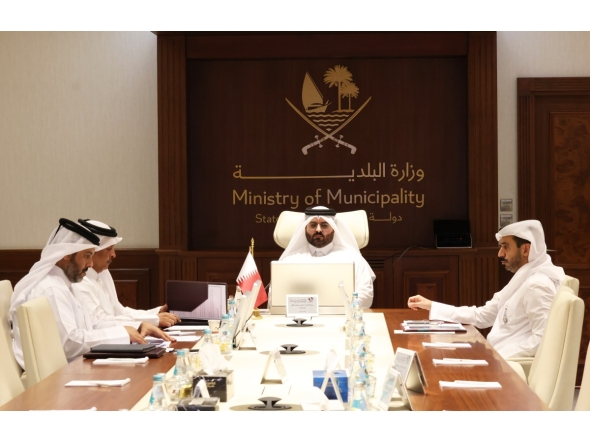 Undersecretary of the Ministry of Municipality H E Eng. Ali bin Mohammed Al Ali and other officials participating in the meeting.