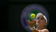 Kazakhstan's Elena Rybakina serves to Belgium's Elise Mertens during their women's singles third round tennis match on the sixth day of the 2026 Wimbledon Championships at The All England Lawn Tennis and Croquet Club in Wimbledon, southwest London, on July 4, 2026. (Photo by Glyn KIRK / AFP) 