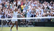 Philippines' Alexandra Eala celebrates beating Poland's Iga Swiatek during their women's singles third round tennis match on the sixth day of the 2026 Wimbledon Championships at The All England Lawn Tennis and Croquet Club in Wimbledon, southwest London, on July 4, 2026. (Photo by Henry NICHOLLS / AFP) / RESTRICTED TO EDITORIAL USE