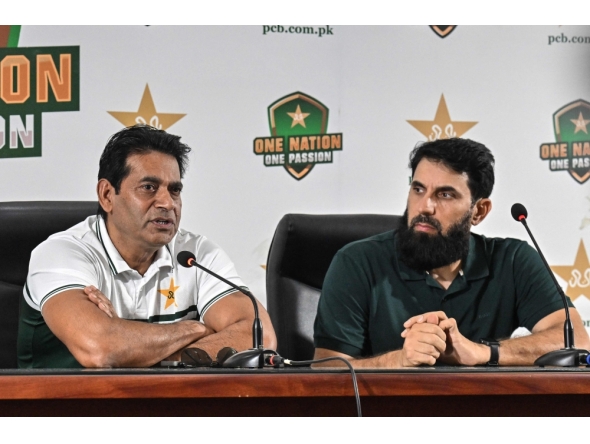 Pakistan national cricket selection committee members Aaqib Javed (L) and Misbah-ul-Haq address a press conference in Lahore on July 5, 2026.  (Photo by Arif ALI / AFP)
