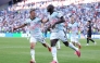 Romelu Lukaku #9 of Belgium celebrates with Timothy Castagne #21 after scoring the team's fourth goal. Jamie Squire/Getty Images/AFP