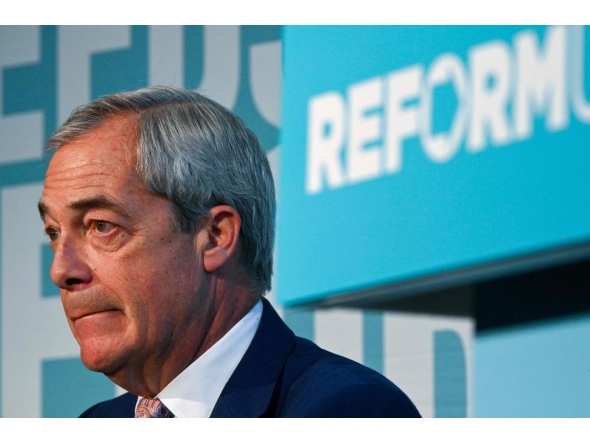 (FILES) Reform UK leader Nigel Farage attends a party press conference in London on November 18, 2025. (Photo by Justin TALLIS / AFP)